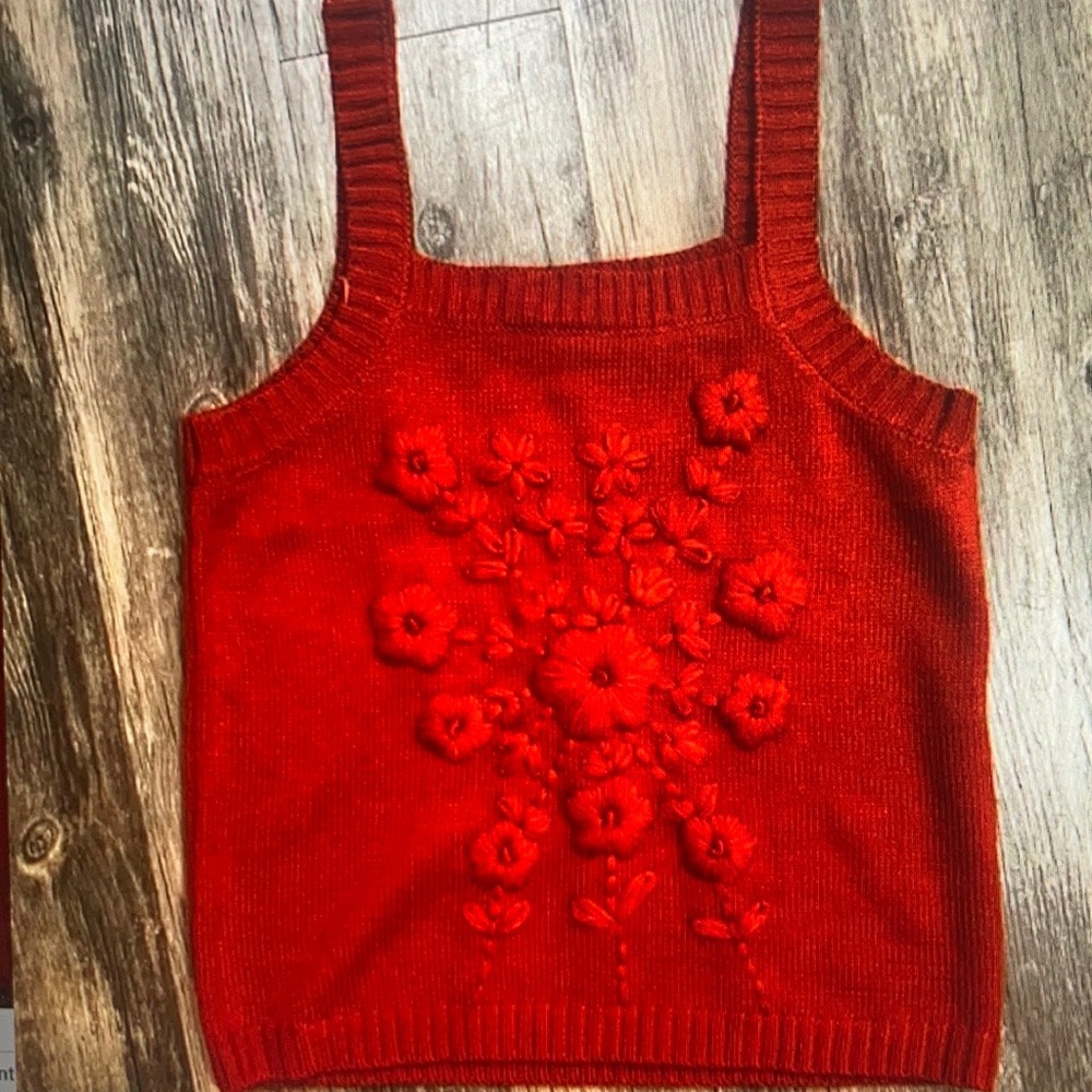 Top with floral embroidery